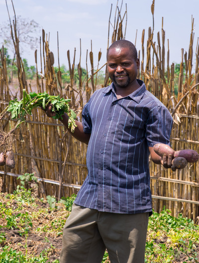 Farmer Displaying Yield
